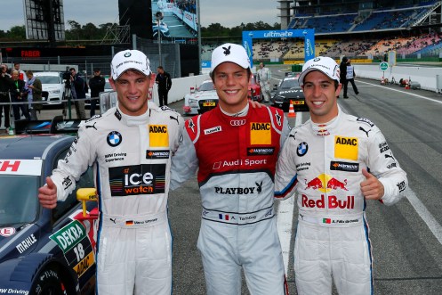 Tambay (centre) celebrates with Wittmann (left) and da Costa (right). © DTM.