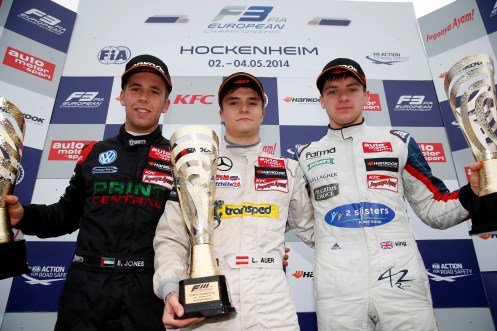 Auer centred the podium celebrations. © FIA.