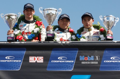 Cao (centre) celebrates with Rao (left) and Cong (right). © Jacob Ebrey Photography / SRO.